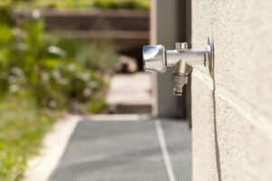 %Title% | Perfect Plumbing, Heating &Amp; Air A frost-free spigot emerges from a wall.